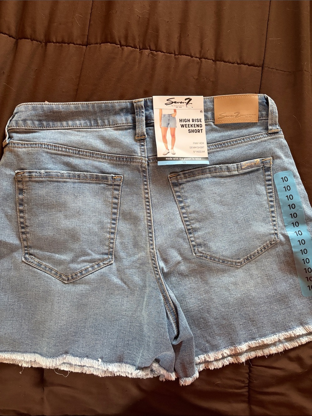 Seven7 Light Wash High Rise Denim Shorts with Raw Hem
